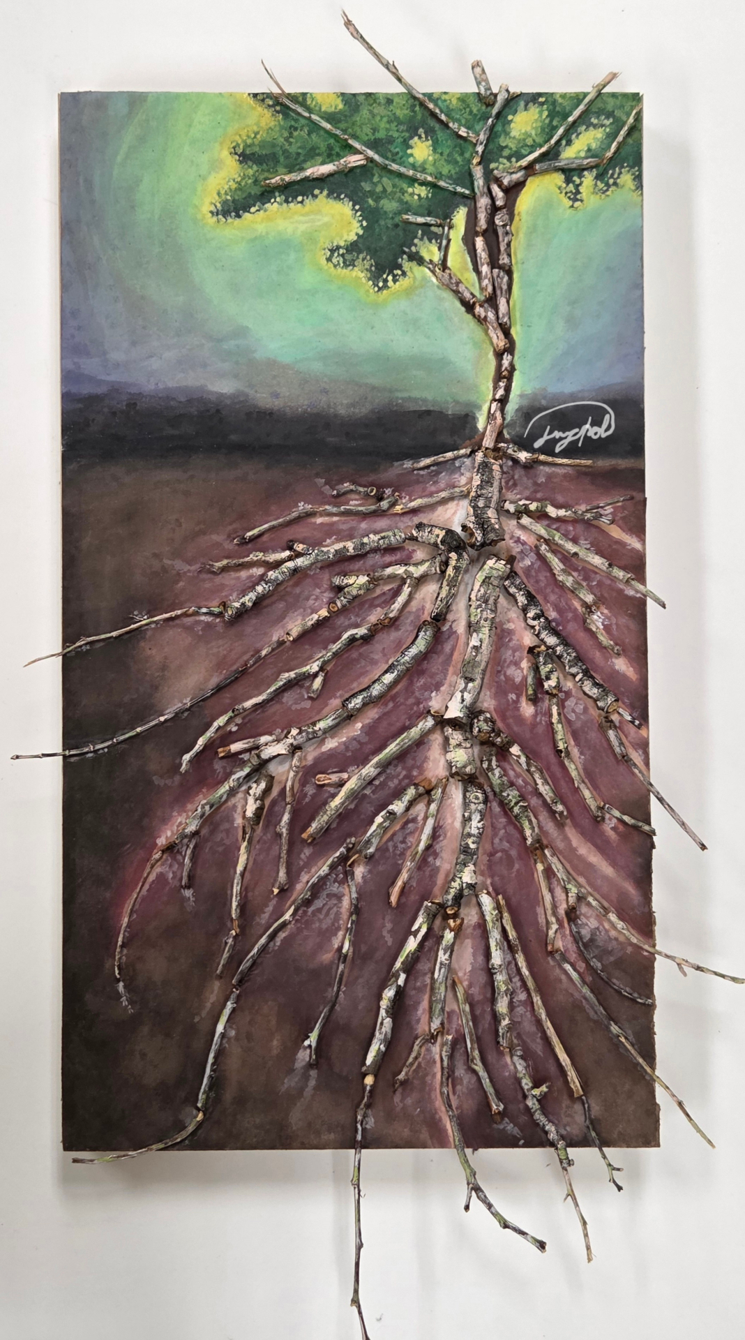 Mixed-media tree work with real branches extending from the roots and canopy over a painted landscape.